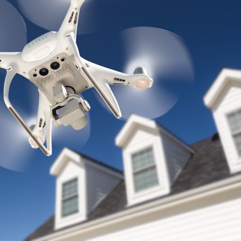A drone capturing stunning property footage, showcasing our real estate video services.